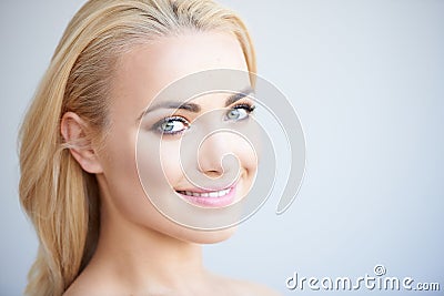 Beautiful blond woman with a lovely smile Stock Photo