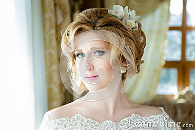 Beautiful blonde Bride portrait wedding makeup and hairstyle Stock Photo