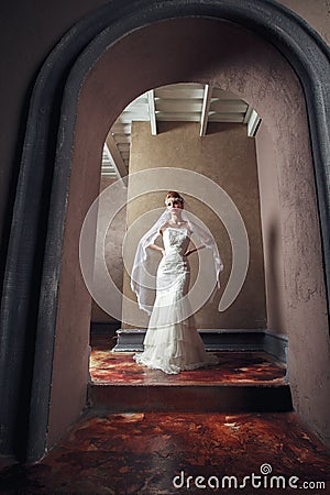 Beautiful Blonde Bride Woman. White Wedding Dress. Vintage Grung Stock Photo