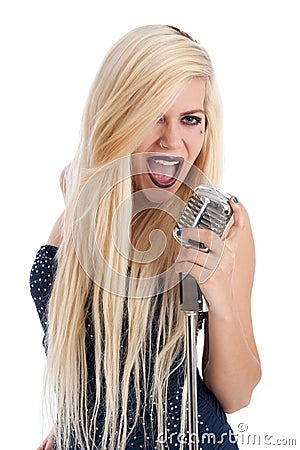 Beautiful blonde female singer in blue dress Stock Photo