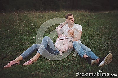 Beautiful blonde girl with boyfriend Stock Photo