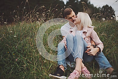 Beautiful blonde girl with boyfriend Stock Photo