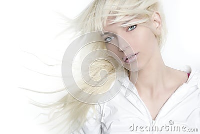 Beautiful blonde girl fashion wind long hair Stock Photo