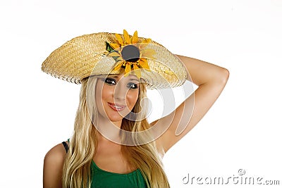 Beautiful blonde girl with hat and sunflower Stock Photo