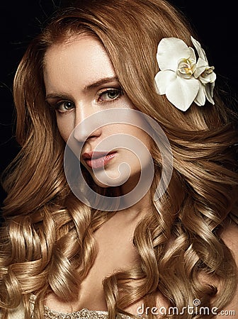 Beautiful blonde with long wavy hair. Stock Photo