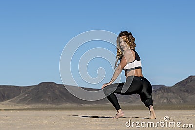 Gorgeous Blonde Model Posing Outdoors In The Desert Stock Photo