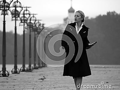 Beautiful blonde on promenade Stock Photo