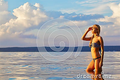 Beautiful blonde in sea Stock Photo