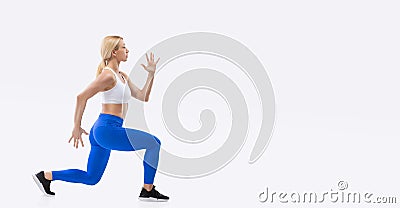 Beautiful blonde sexy fit girl posing, isolated on white background. Fitness concept Stock Photo