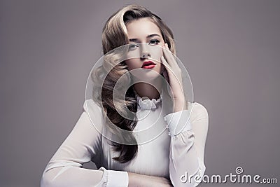 Beautiful Blonde Woman. Retro Fashion Image. Stock Photo