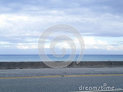 Beautiful blue coastline in the distance Stock Photo