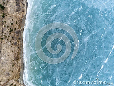 Beautiful blue frozen crystal clean lake aerial drone view Stock Photo