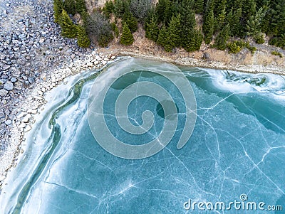 Beautiful blue frozen crystal clean lake aerial drone view Stock Photo