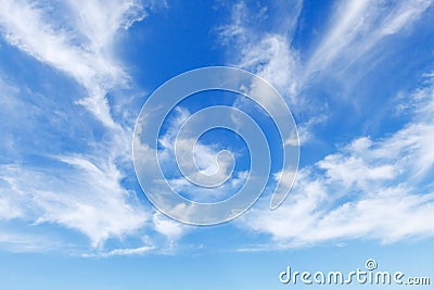 Beautiful blue sky over the sea with translucent, white, Cirrus clouds Stock Photo