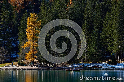 The beautiful Braies lake in late autumn with a little snow, Pearl of the Dolomite lakes is an UNESCO heritage and is located in Editorial Stock Photo