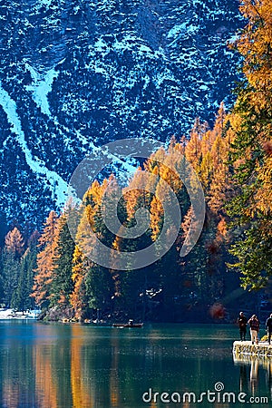 The beautiful Braies lake in late autumn with a little snow, Pearl of the Dolomite lakes is an UNESCO heritage and is located in Editorial Stock Photo