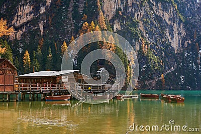 The beautiful Braies lake in late autumn with a little snow, Pearl of the Dolomite lakes is an UNESCO heritage and is located in Editorial Stock Photo