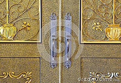 Beautiful brass door with aluminium handle Stock Photo