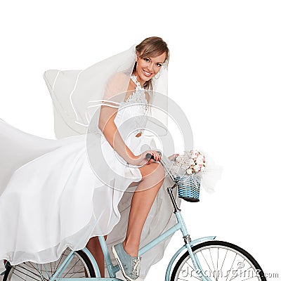 Beautiful bride on bicycle Stock Photo