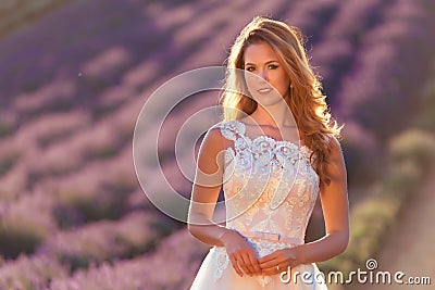 Beautiful bride in wedding day in lavender field Stock Photo
