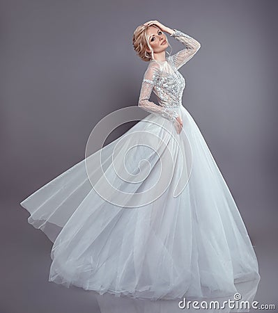 Beautiful bride in wedding flowing chiffon dress, Woman in long Stock Photo