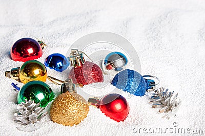 Beautiful, bright Christmas balls in snow. Stock Photo