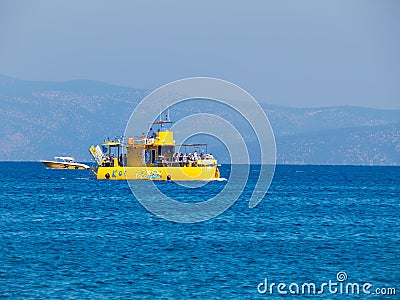 A beautiful bright ship `Yellow submarine` near island Kos, Greece Editorial Stock Photo