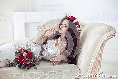 Beautiful brunette Bride wedding Portrait. Red lips makeup. Long Stock Photo