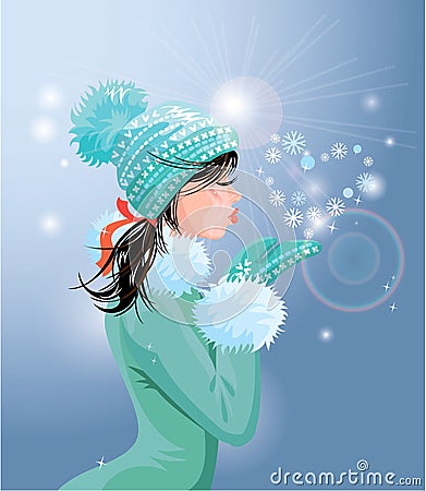 Beautiful brunette girl with warm blue winter hat is blowing Stock Photo