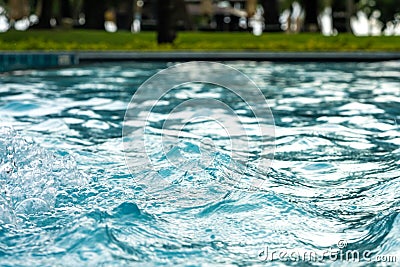Blue clear fresh Water in pool. Spa massage background. Stock Photo