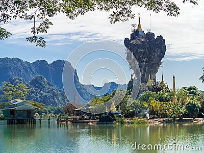 Beautiful Buddhist Kyauk Kalap Pagoda in Hpa-An, Myanmar. Stock Photo