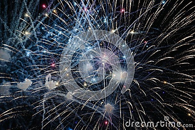 Beautiful burst of colorful fireworks in the night sky Stock Photo