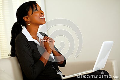 Beautiful business woman on black suit and smiling Stock Photo