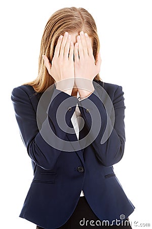 Beautiful business woman covering her face. Stock Photo