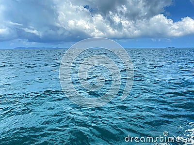 Beautiful calm sea wave under clear blue sky background Stock Photo