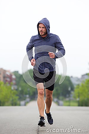 Beautiful carefree middle age runner outside Stock Photo