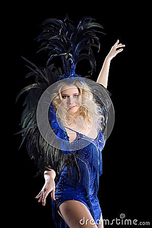 Carnival dancer in costume of feathers. Stock Photo