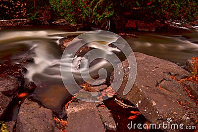 Flowing Ontonagon River Small Waterfalls in October Stock Photo