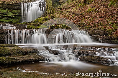 Beautiful Cascading Waterfall In Peaceful Woodland Setting. Stock Photo