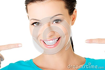 Beautiful casual woman showing her perfect white teeth. Stock Photo