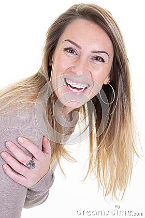 Beautiful caucasian blond girl with long blonde hairstyle smiling laughing posing Stock Photo