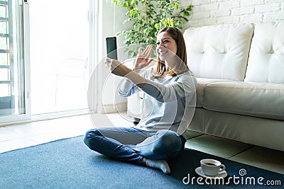 Happy woman during a video call Stock Photo