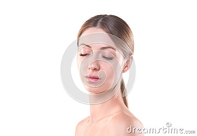 Beautiful caucasian female face with closed eyes and fair hair up in ponytail, close up. Young woman portrait with no Stock Photo