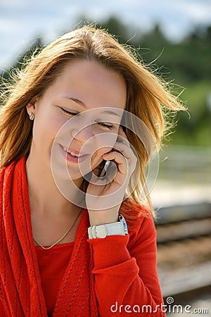 Beautiful caucasian girl talking to phone Stock Photo