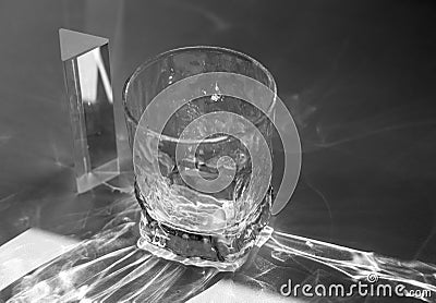 Beautiful caustic effect as light passes through a glass Stock Photo