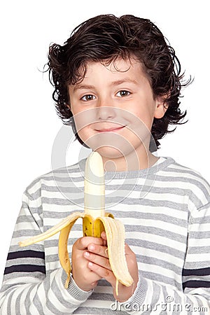 Beautiful child eating a banana Stock Photo
