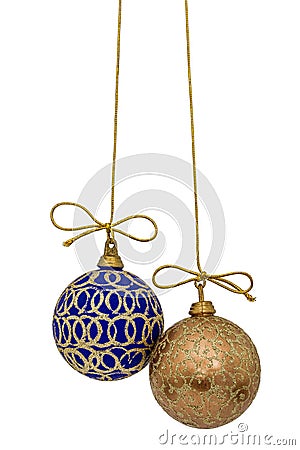 Beautiful Christmas balls are suspended on a gold thread, isolated on white background Stock Photo