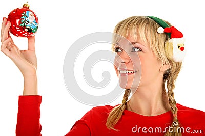 Beautiful Christmas girl holding in her hand toy Stock Photo