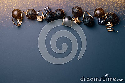 Beautiful Christmas gold silver decorations Christmas balls toys on a dark background. New Year Christmas concept Stock Photo