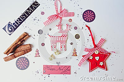 Beautiful Christmas and New Year attributes. Beautifully laid out on a white background and sprinkled with dove hoarfrost and spar Stock Photo